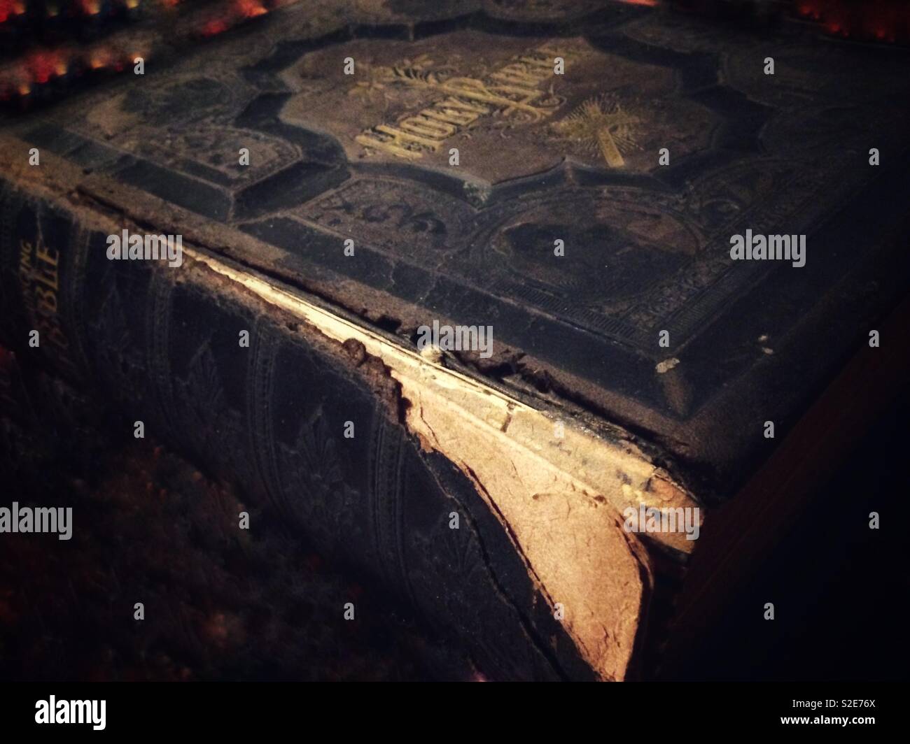 Old weathered ornate leather family Bible - Smartphone Captured Stock Image