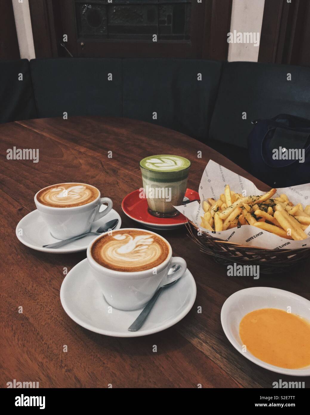 Afternoon coffee and matcha latte with fries Stock Photo