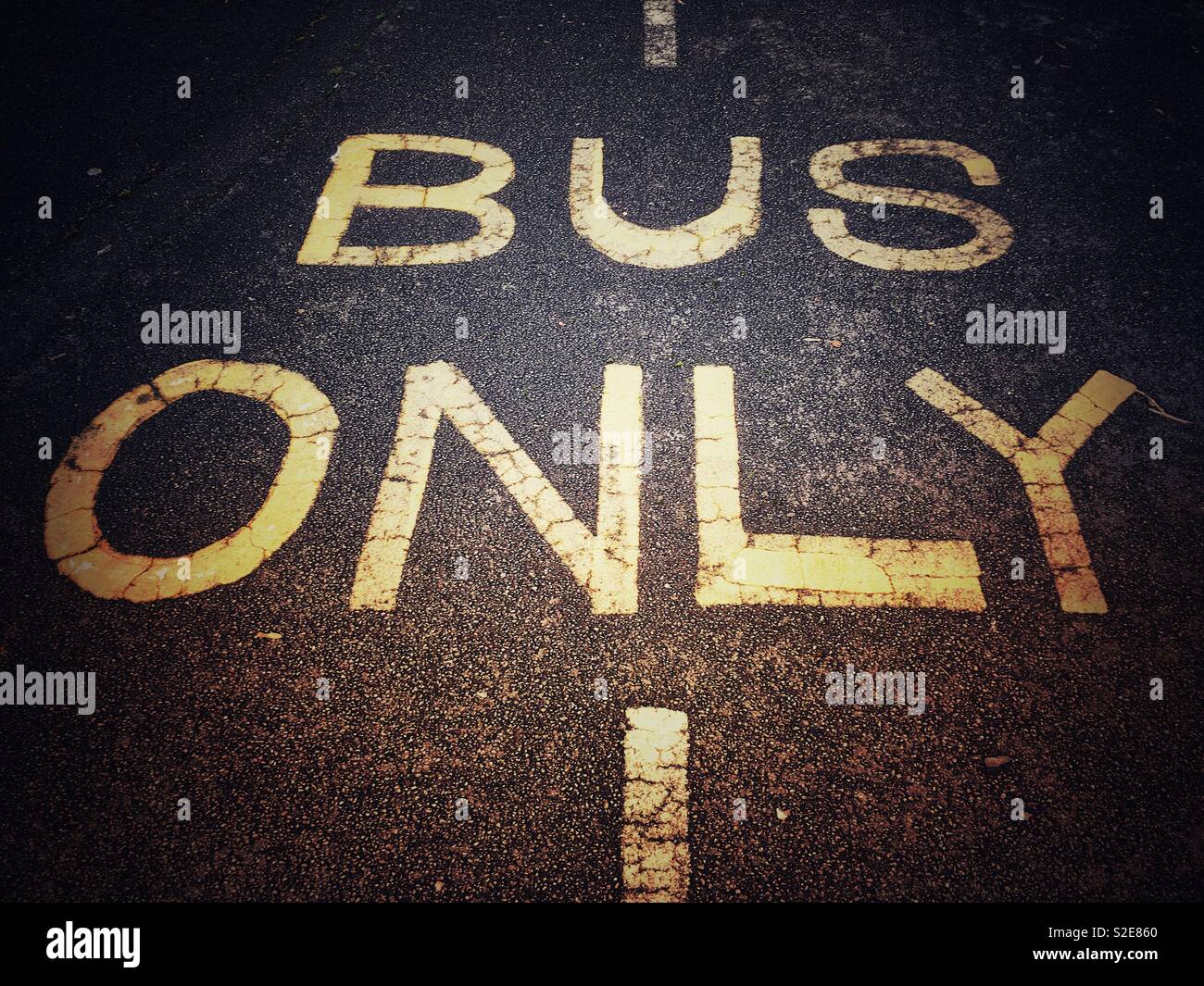 Bus only writing on tarmac Uk - Smartphone Captured Stock Image