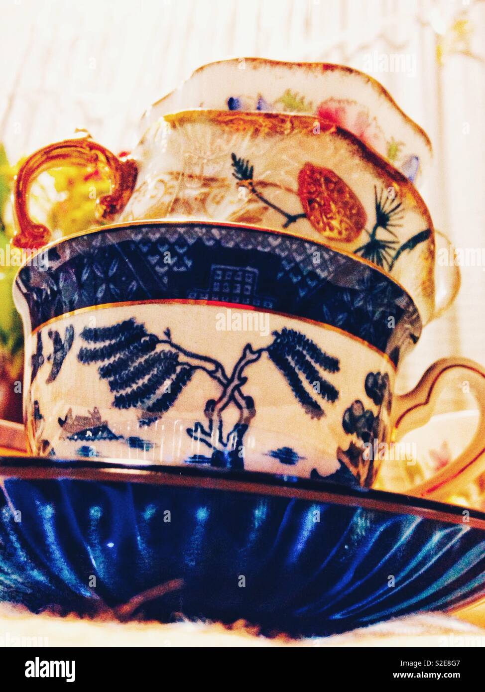 Bright, stacked tea cups with saucer - Smartphone Captured Stock Image