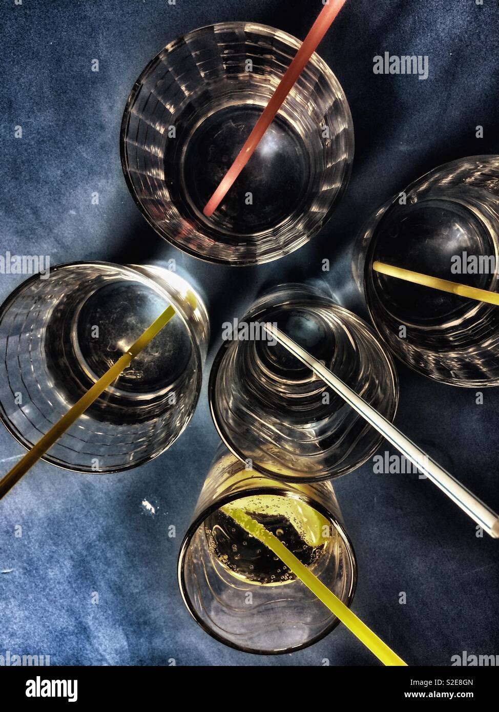 View of glasses with drinks and straws from the top - Smartphone Captured Stock Image