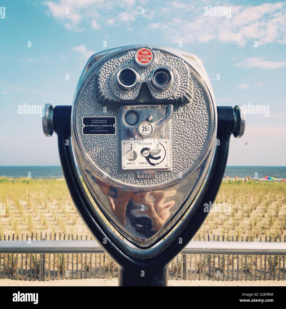 Coin operated binoculars, beach background, beach - Smartphone Captured Stock Image