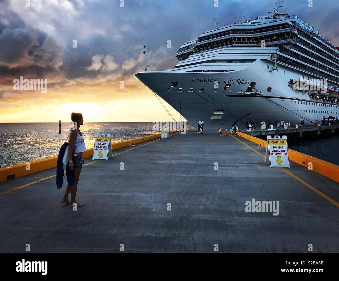 Cruise ship at sunset Stock Photo - Alamy