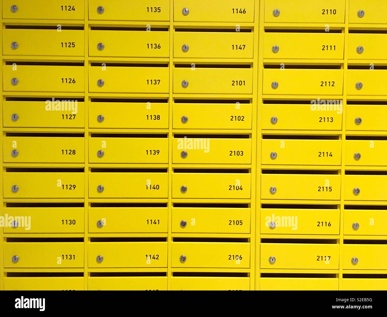 Yellow mail boxes Stock Photo Alamy