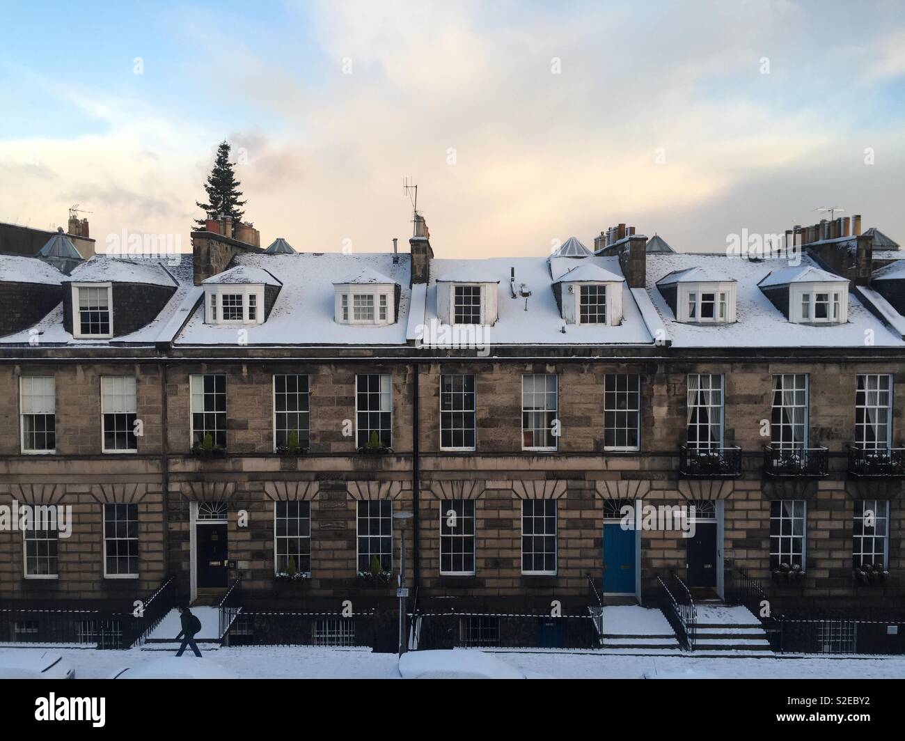 Snowy roofs - Edinburgh New Town historic Georgian houses and street scene in winter snow Stock Photo