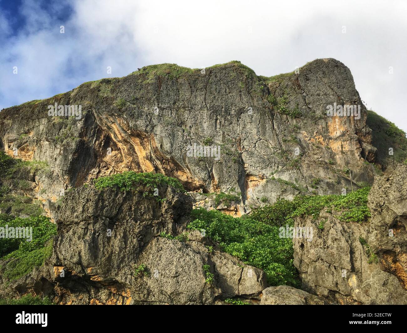 Cliff of the Tagachang Beach, Guam Stock Photo