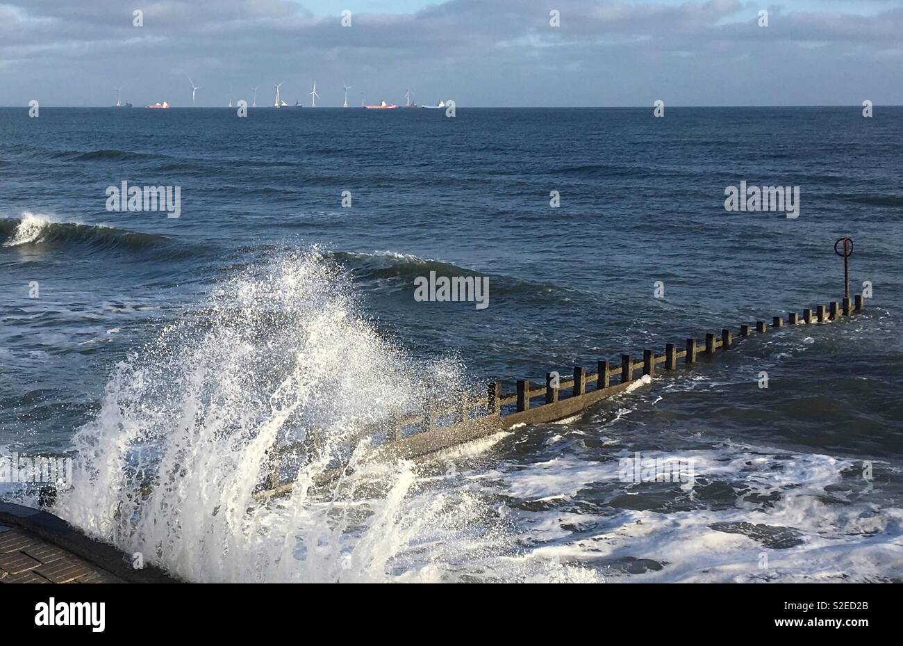 Aberdeen beach with offshore windmills Stock Photo