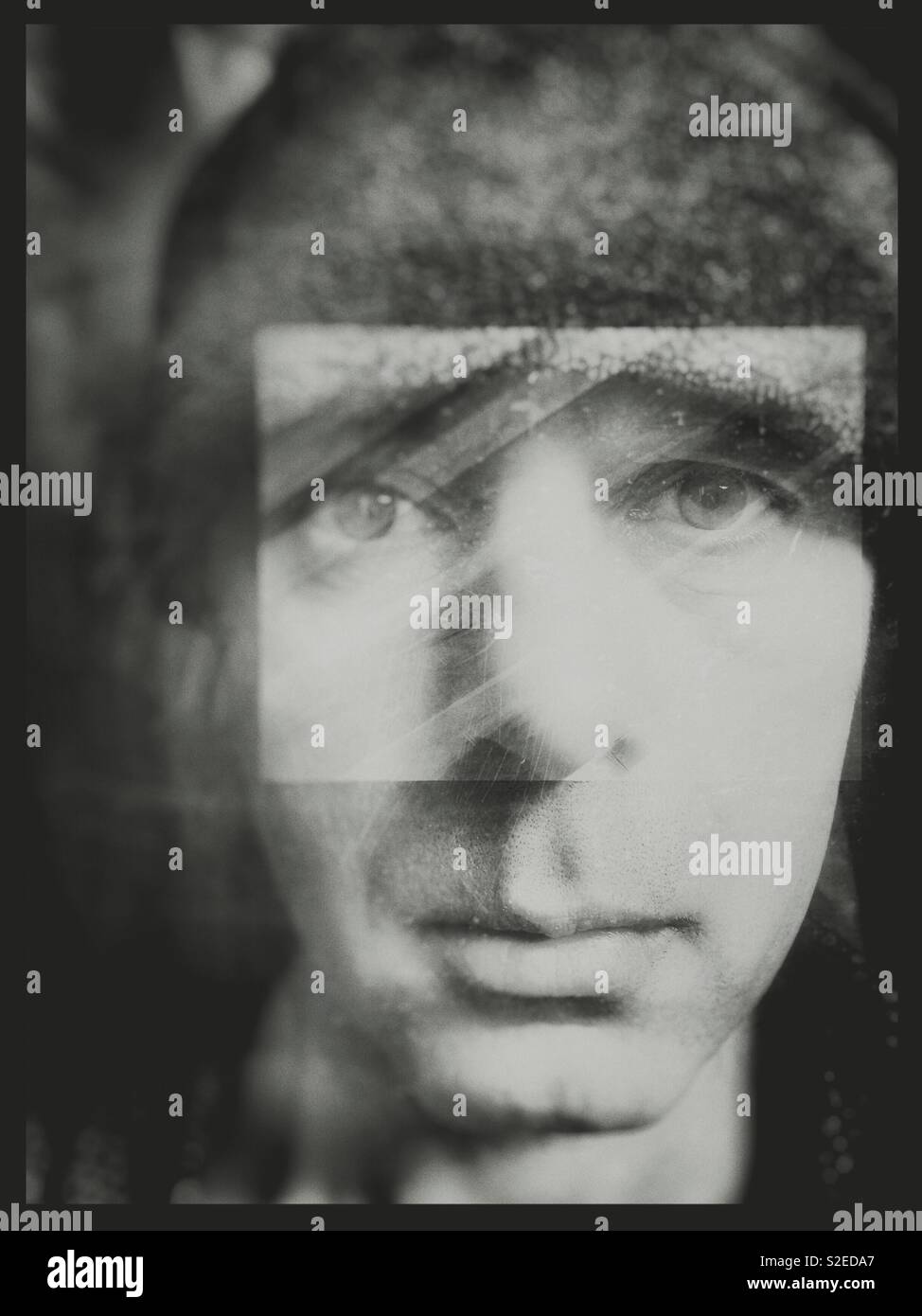 Portrait of man with square focusing the eyes - Smartphone Captured Stock Image