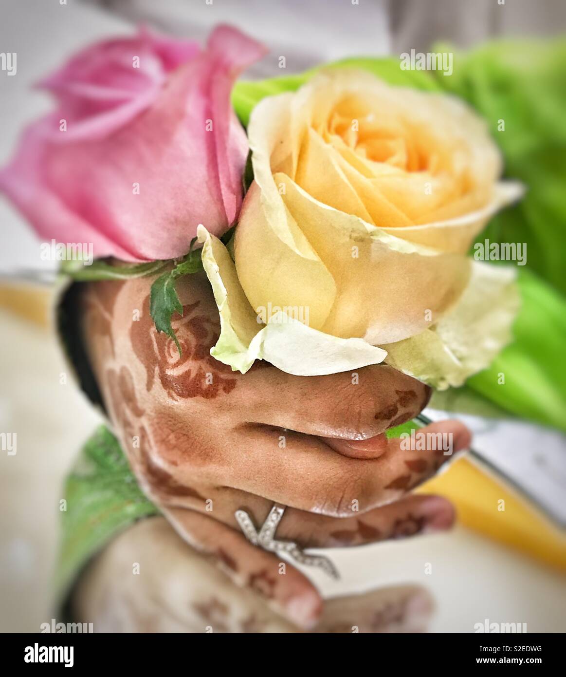 Henna hand with colorful flowers - Smartphone Captured Stock Image