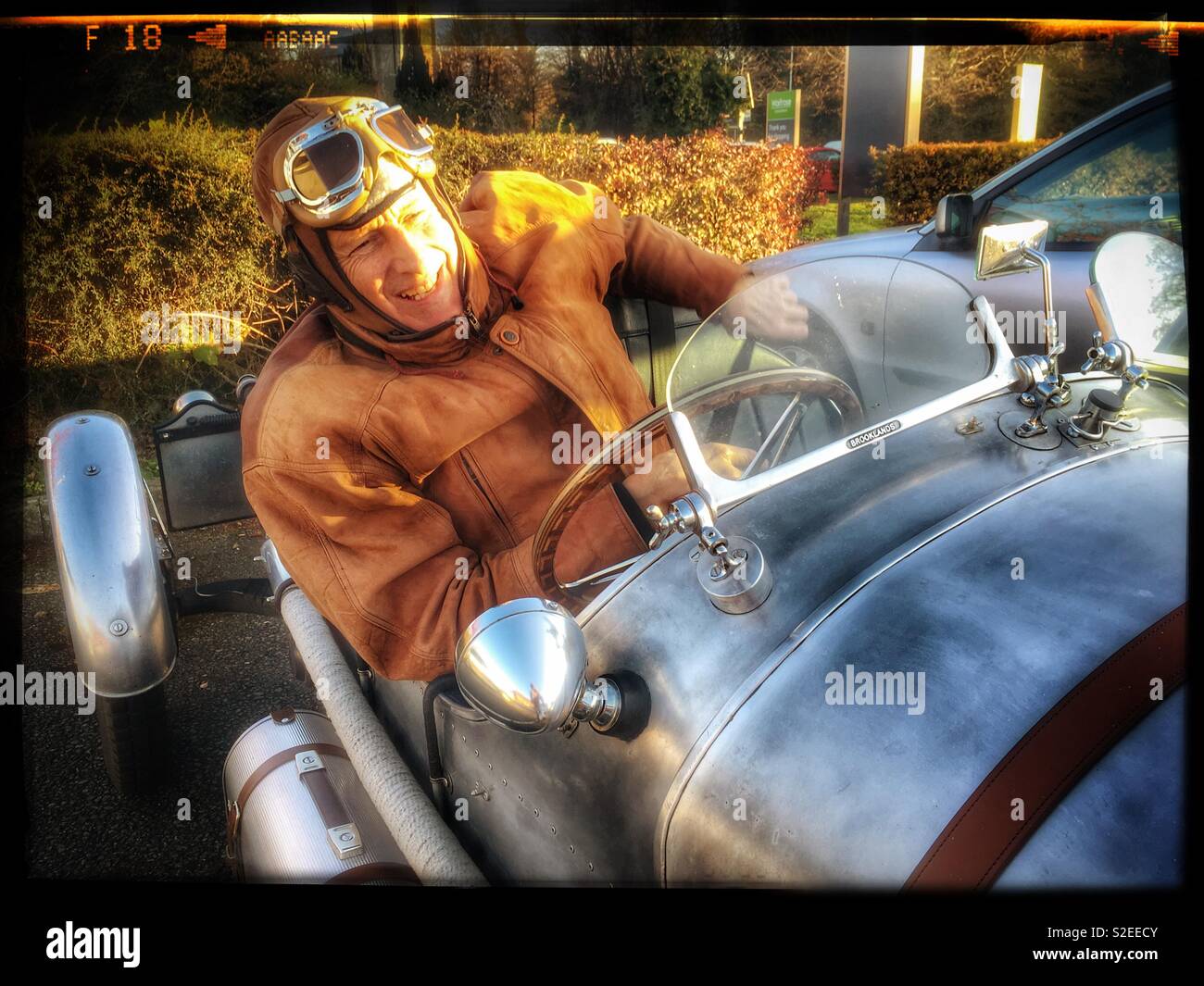 Man driving his homemade sports car powered by a Citroen 2CV engine - Smartphone Captured Stock Image