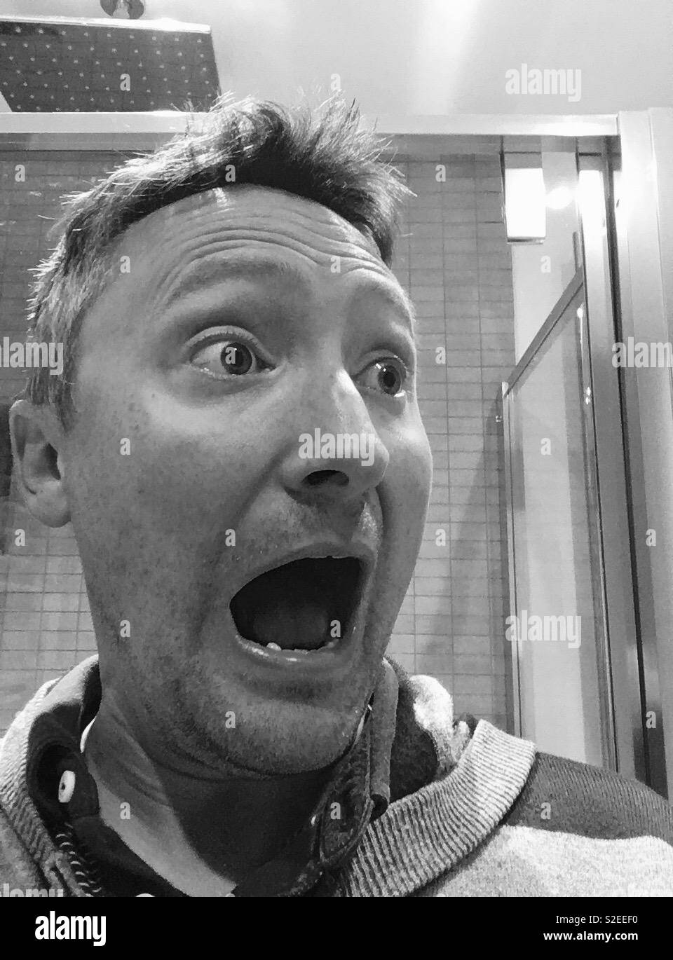 Man screaming in black & white Stock Photo