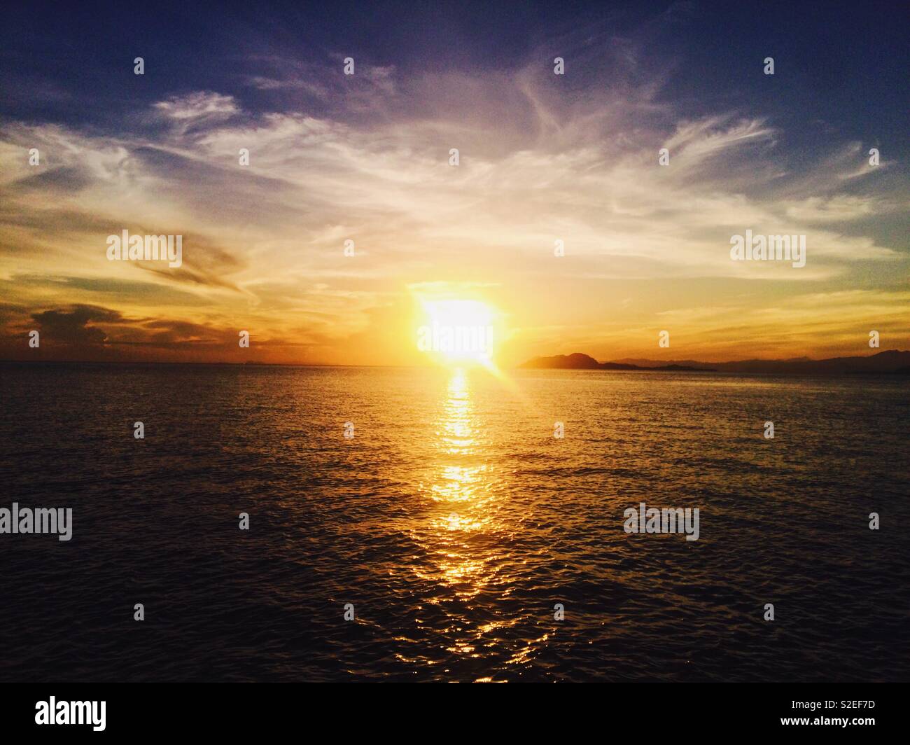 Sunset is addictive. Once you got its best, you’ll crave for it, again and again. This one is the perfect sunset from Labuan Bajo, Indonesia circa 2017. Stock Photo