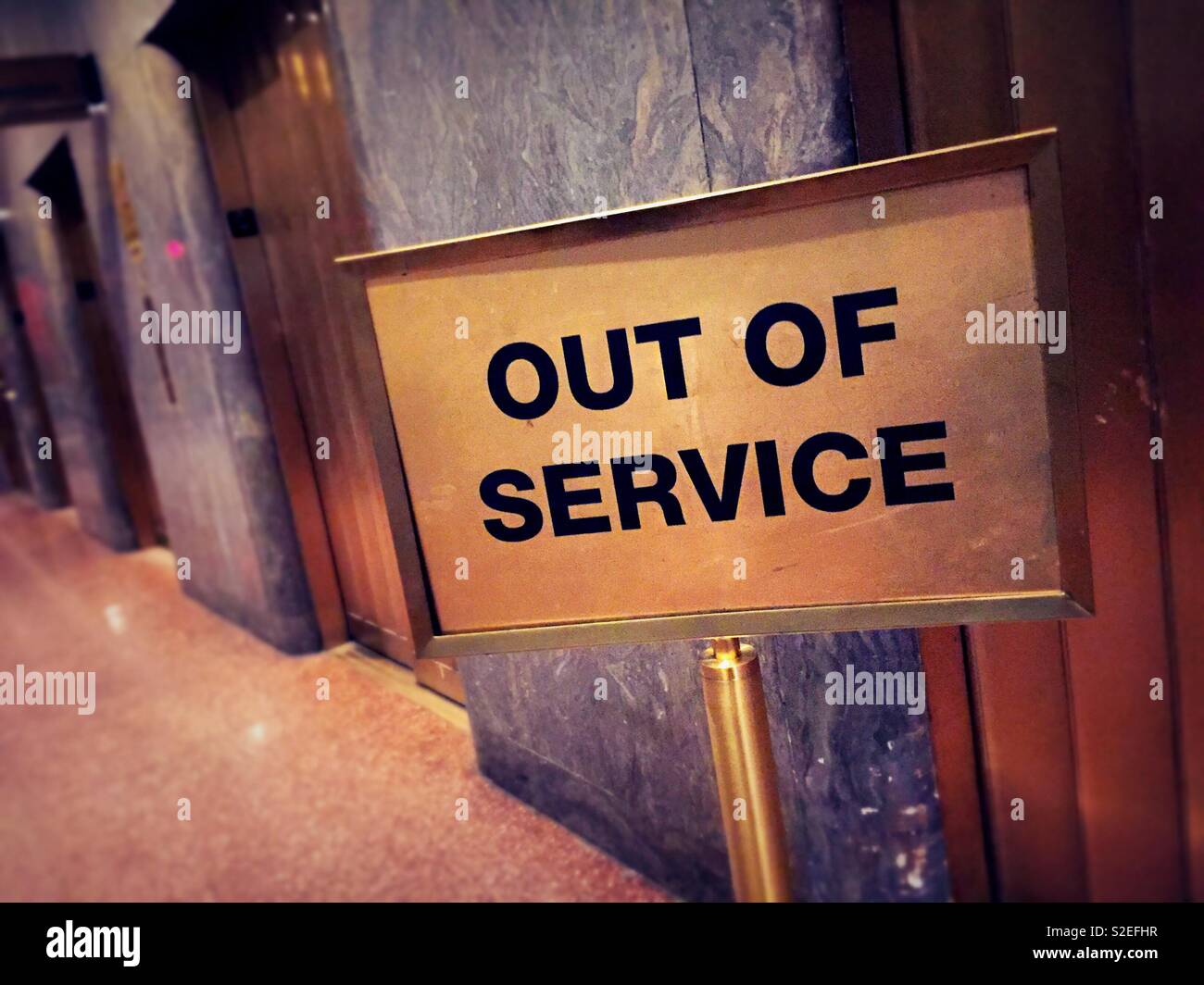 Out of service sign in front of bank of elevators, New York City, United States Stock Photo