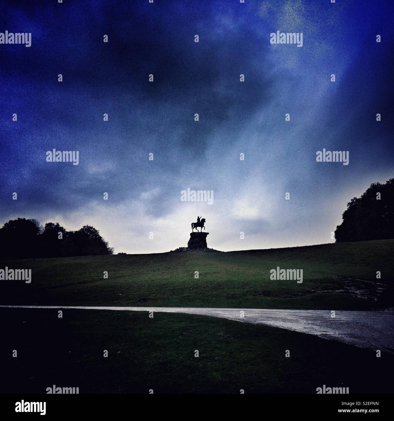 The Copper Horse, a statue marking the end of the Long Walk at Snow Hill in Windsor Great Park. It is a statue of George III on horseback. - Smartphone Captured Stock Image