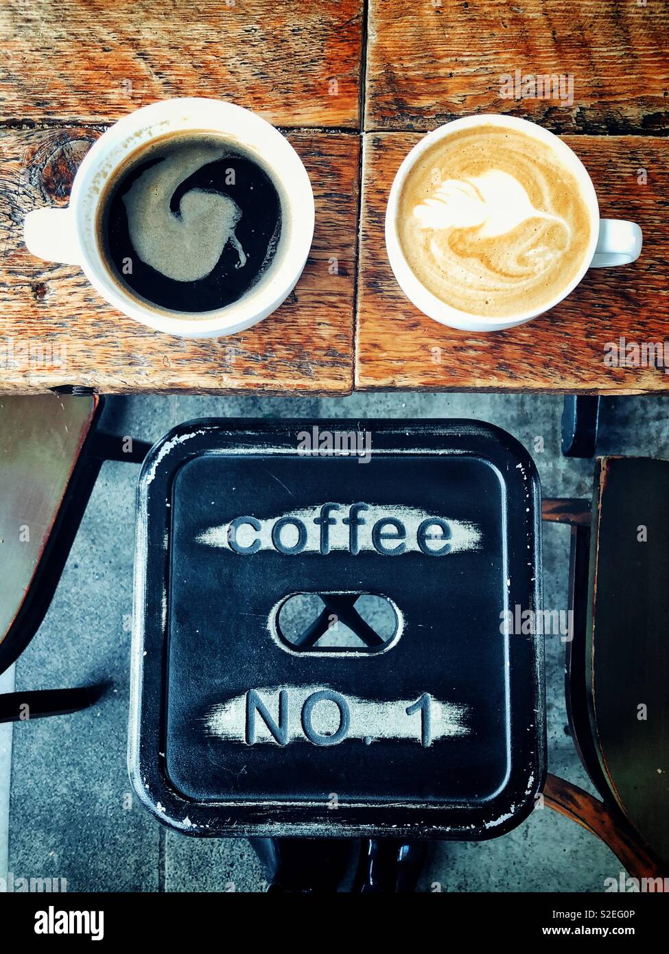 His and Hers coffees - Smartphone Captured Stock Image