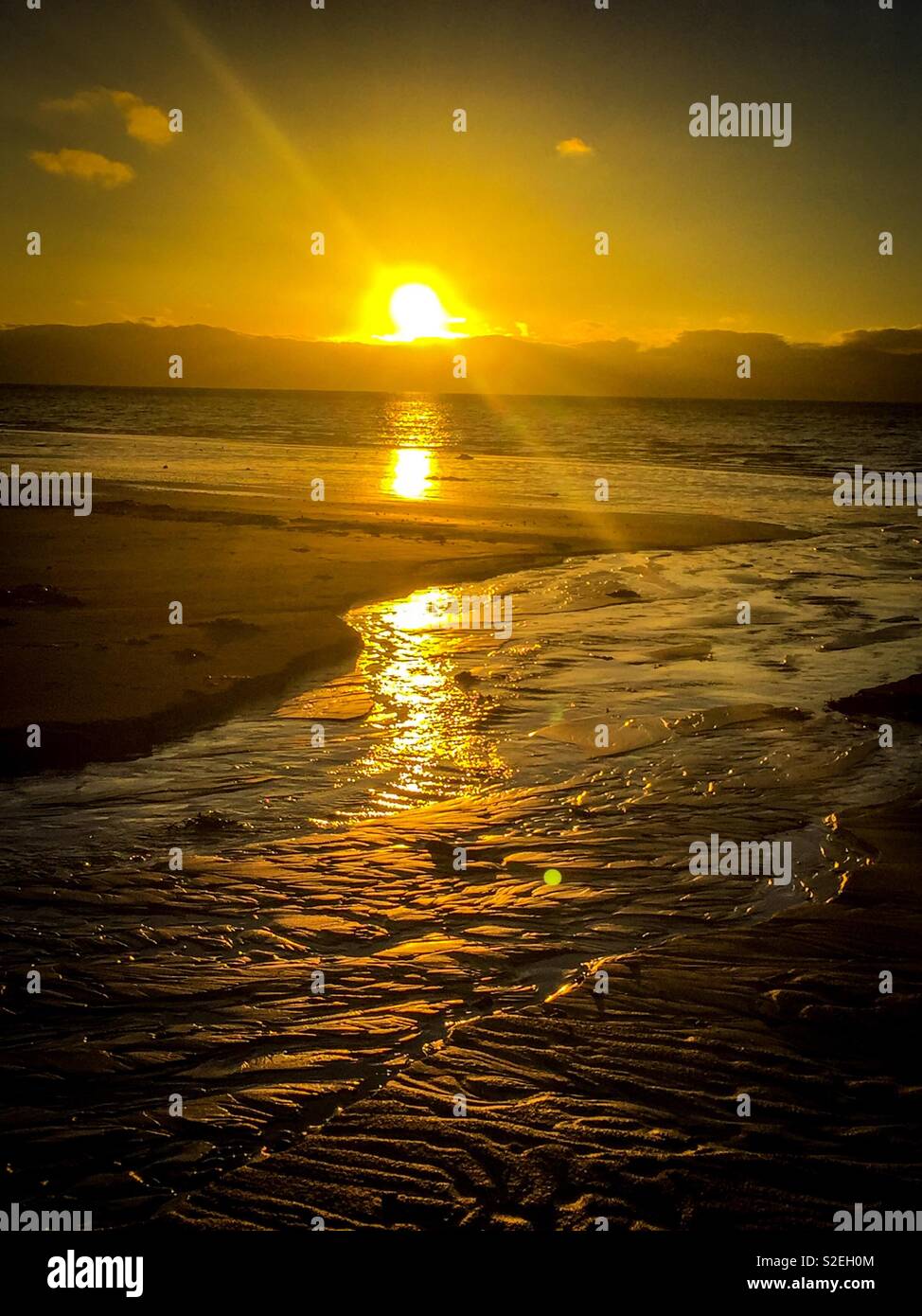 Sunrise over Cardigan Bay, North Wales Stock Photo Alamy