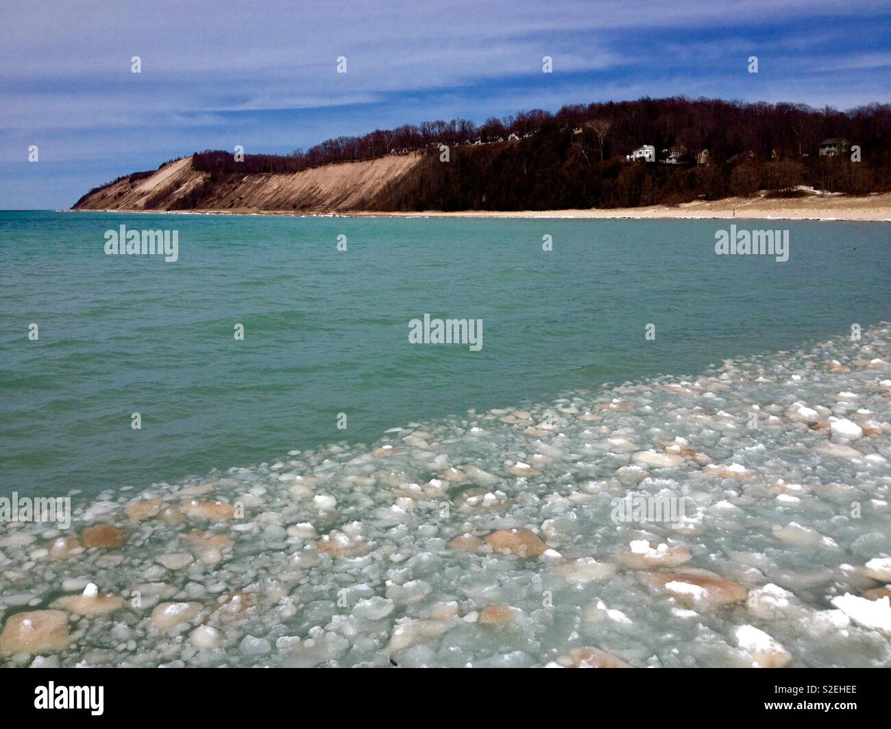 Sand dune and bay filled with ice balls - Smartphone Captured Stock Image