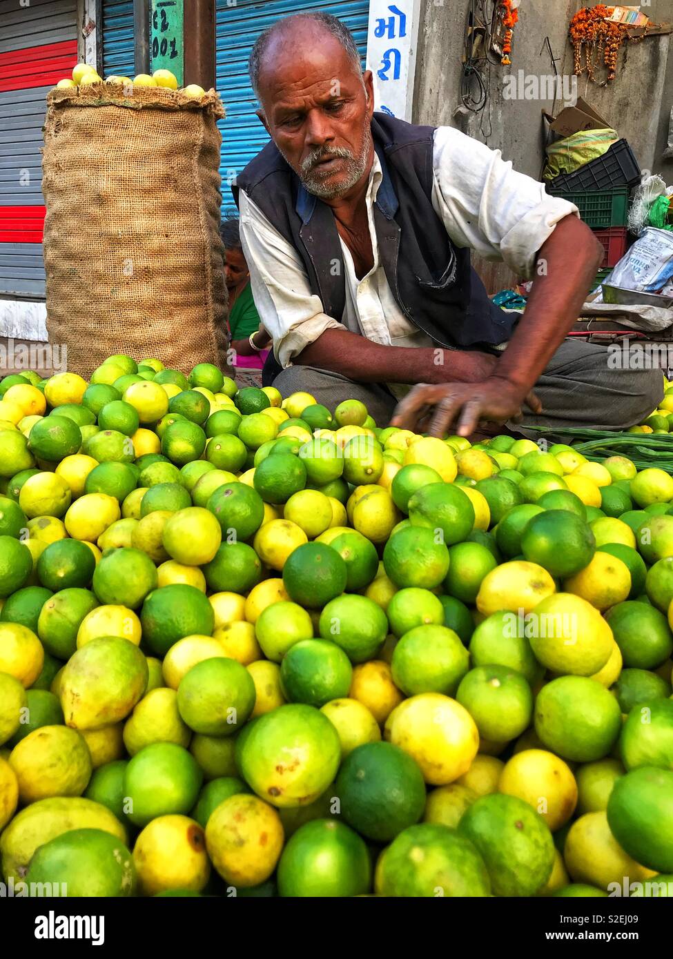Lemon vendor on streets of Rajkot in Gujarat of India. - Smartphone Captured Stock Image