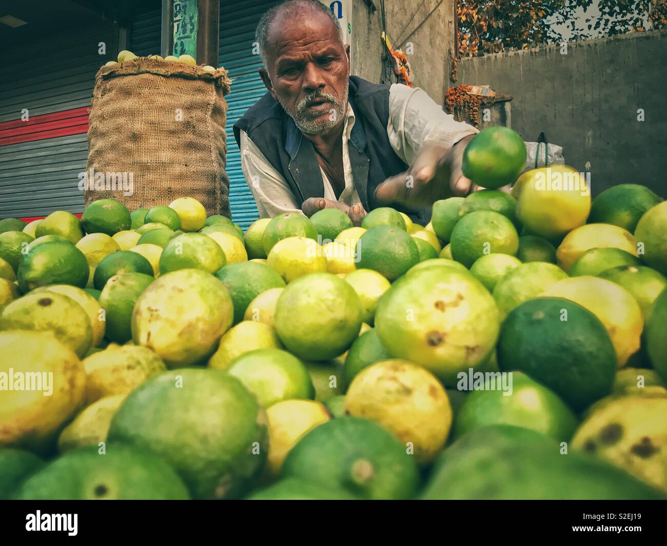 Lemon vendor on streets of Rajkot in Gujarat of India. - Smartphone Captured Stock Image
