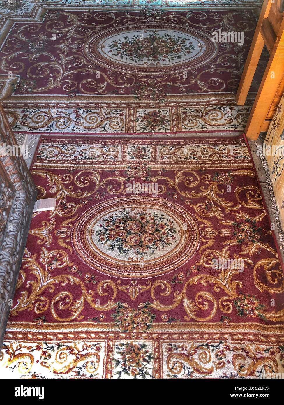Ornate floor pattern in the Sinaia Monastery in Romania. - Smartphone Captured Stock Image