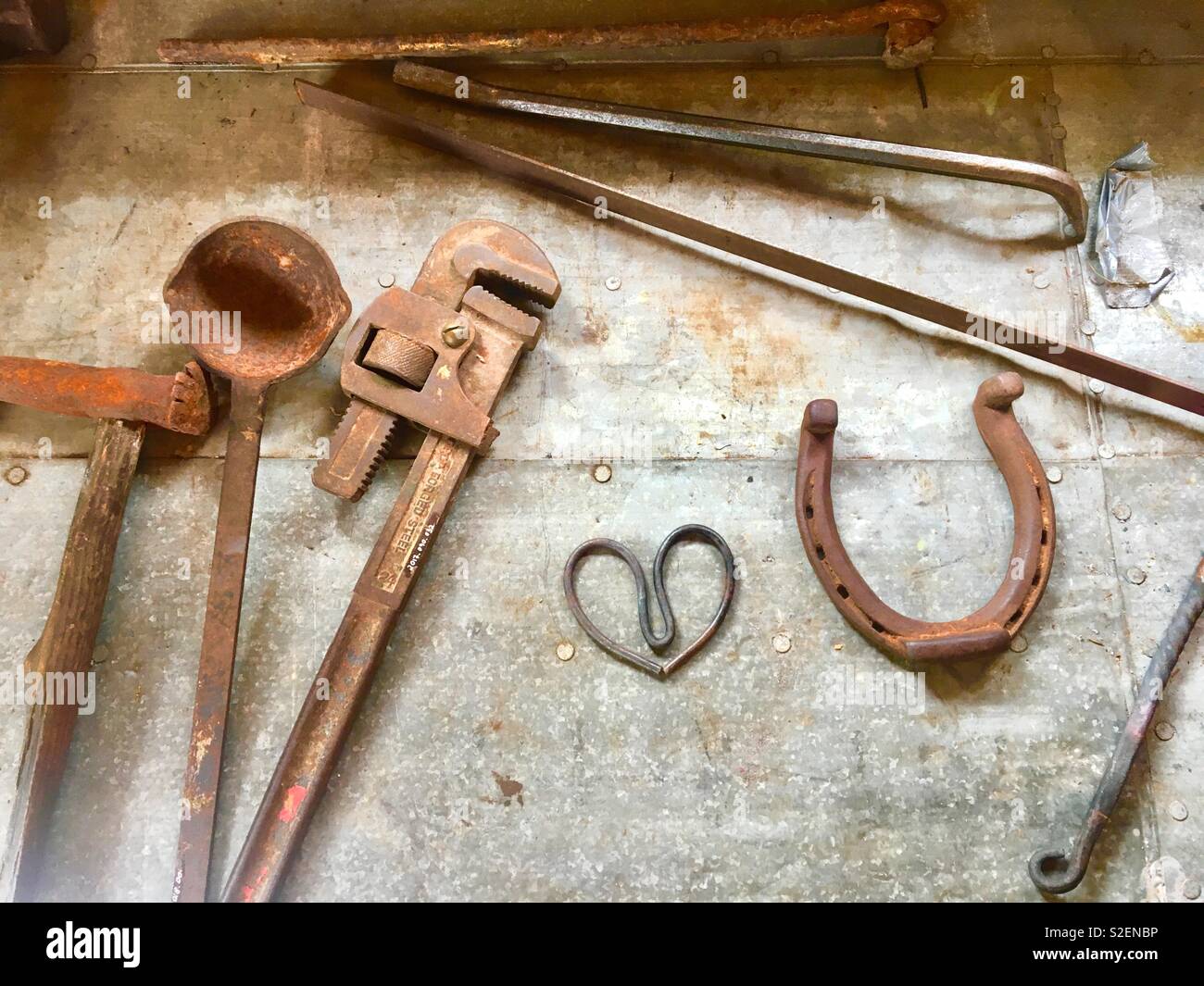 Workshop tools blacksmith horseshoe - Smartphone Captured Stock Image