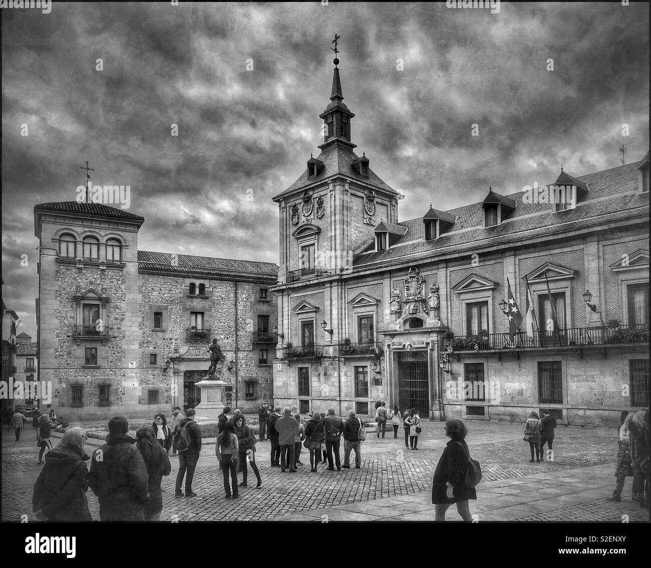 Tourists visit the picturesque and famous Plaza de la Villa in the city centre of Madrid, Spain. This medieval square houses the Ayuntamiento. Photo © COLIN HOSKINS. - Smartphone Captured Stock Image