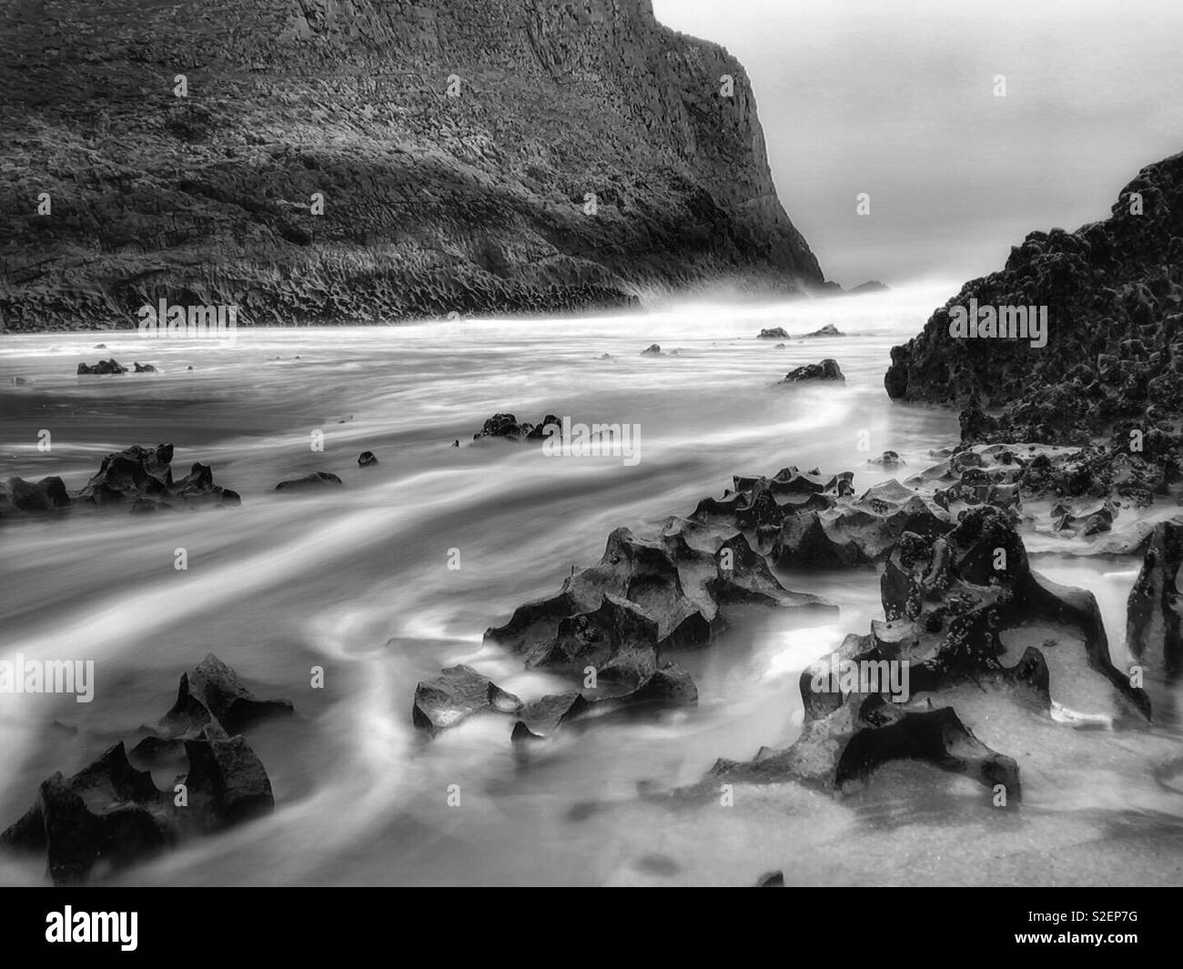 Incoming tide at Mewslade beach, Gower, Wales, November. Stock Photo