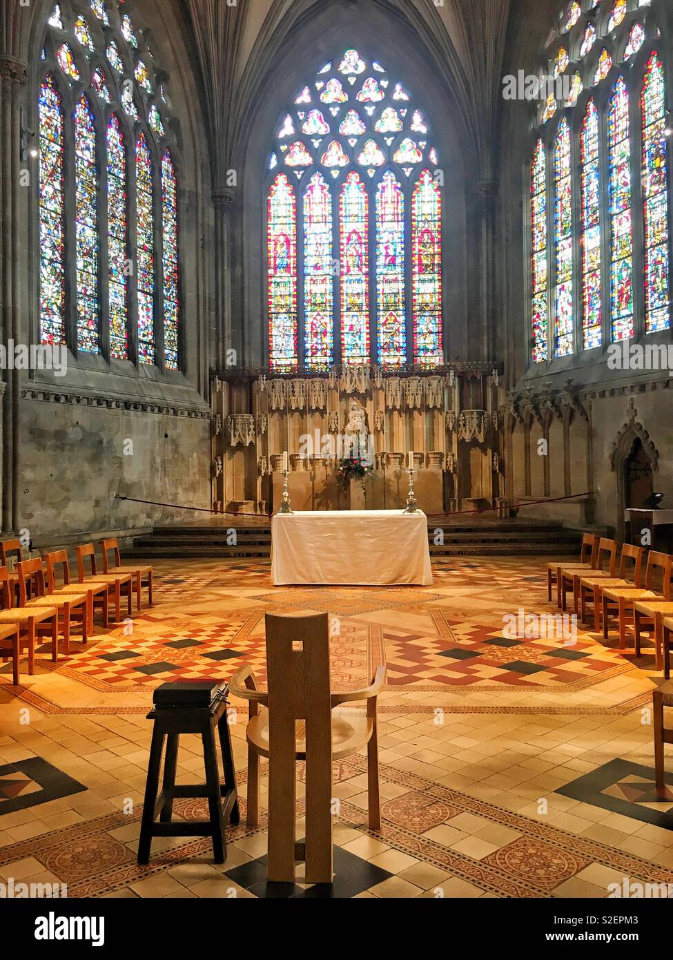 Bright shot of stained glass windows and flooring in Wells Cathedral - Smartphone Captured Stock Image