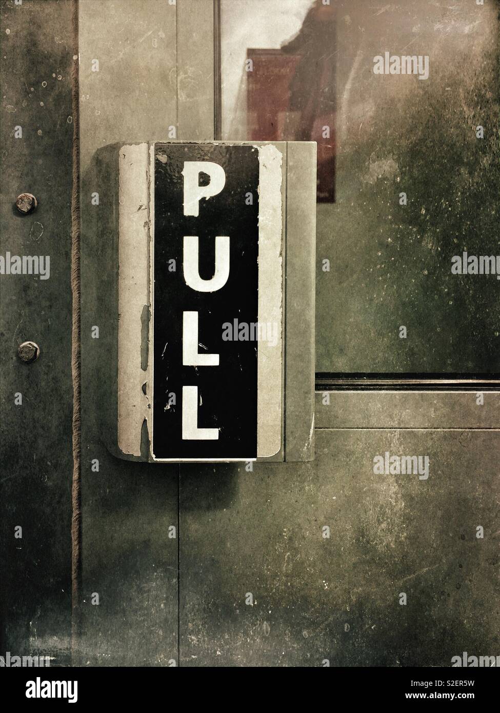 Pull sign on a door - Smartphone Captured Stock Image