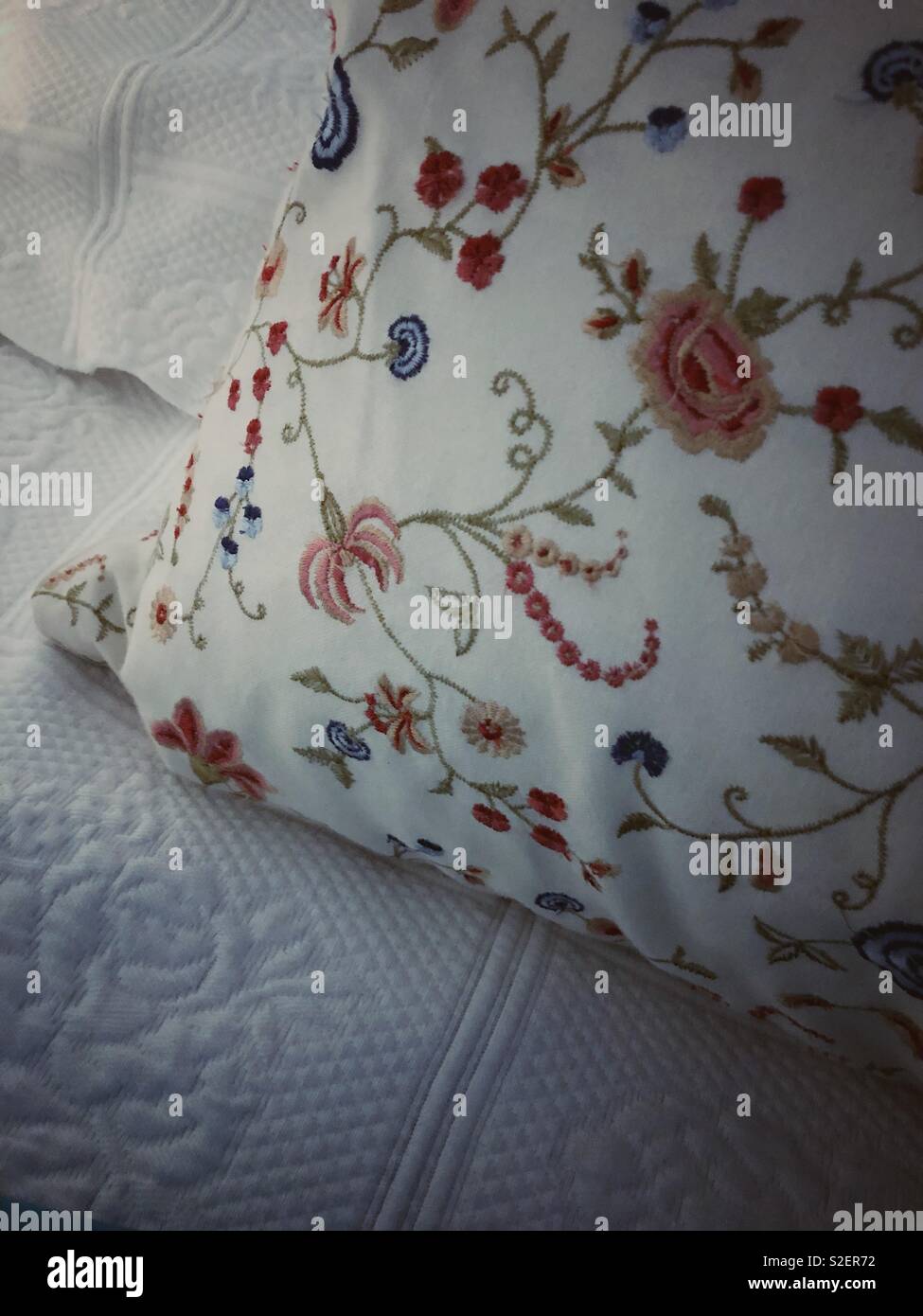 Pillows can add a feel of romance to any setting. - Smartphone Captured Stock Image