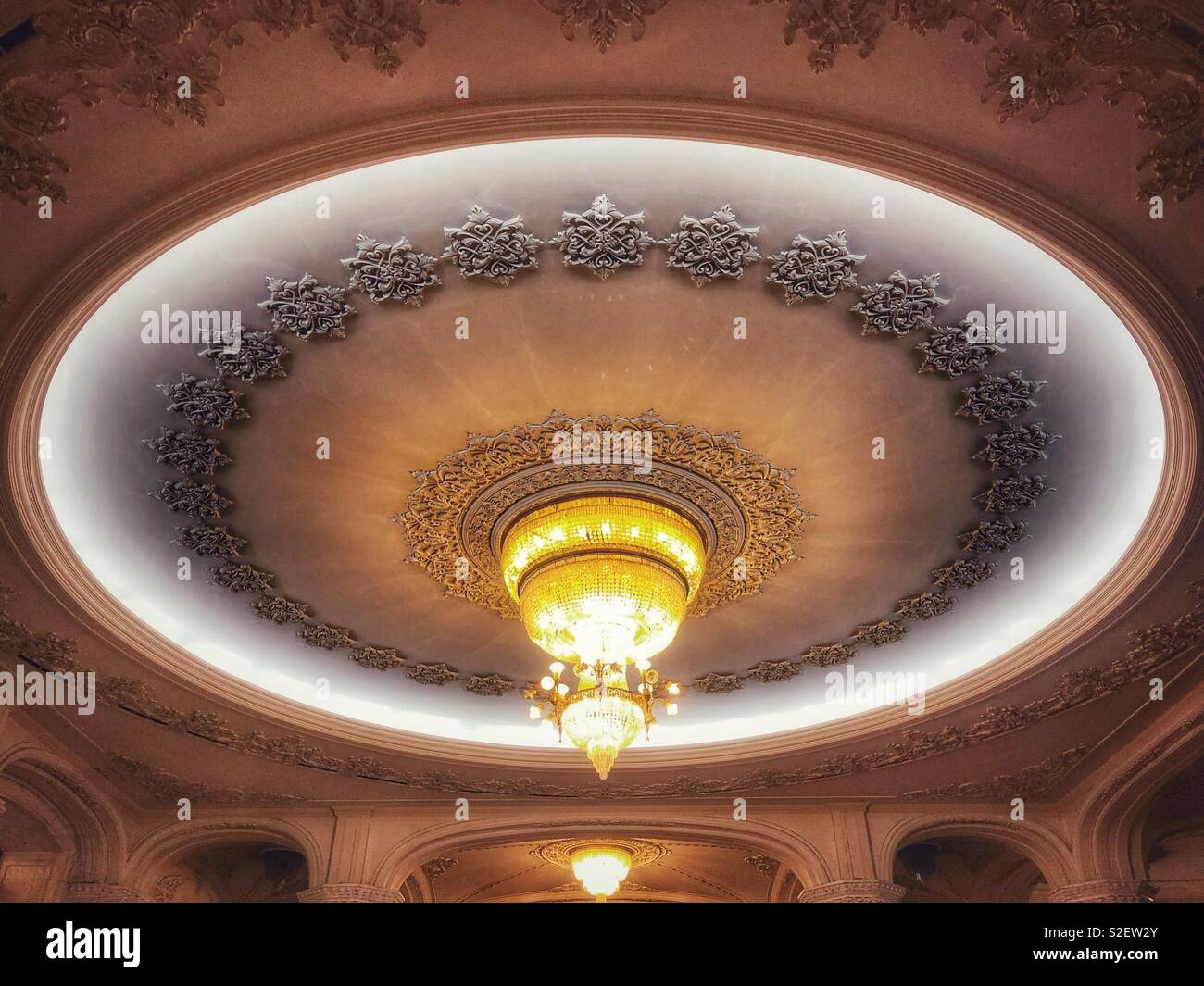 Ornate Ceiling Light In The Presidential Palace In Bucharest