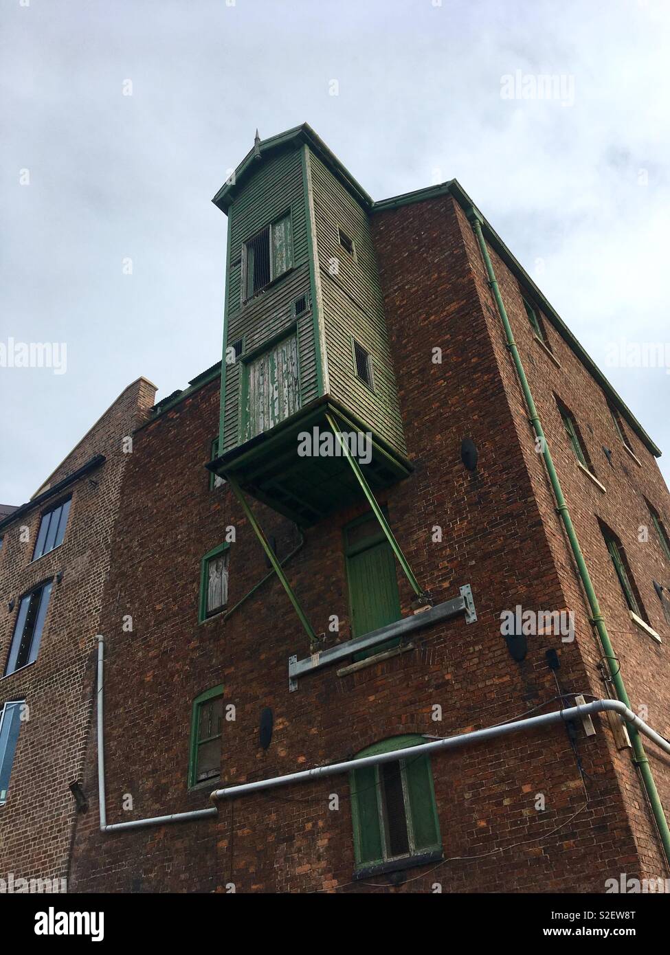 Old mill with jettied hoist - Smartphone Captured Stock Image