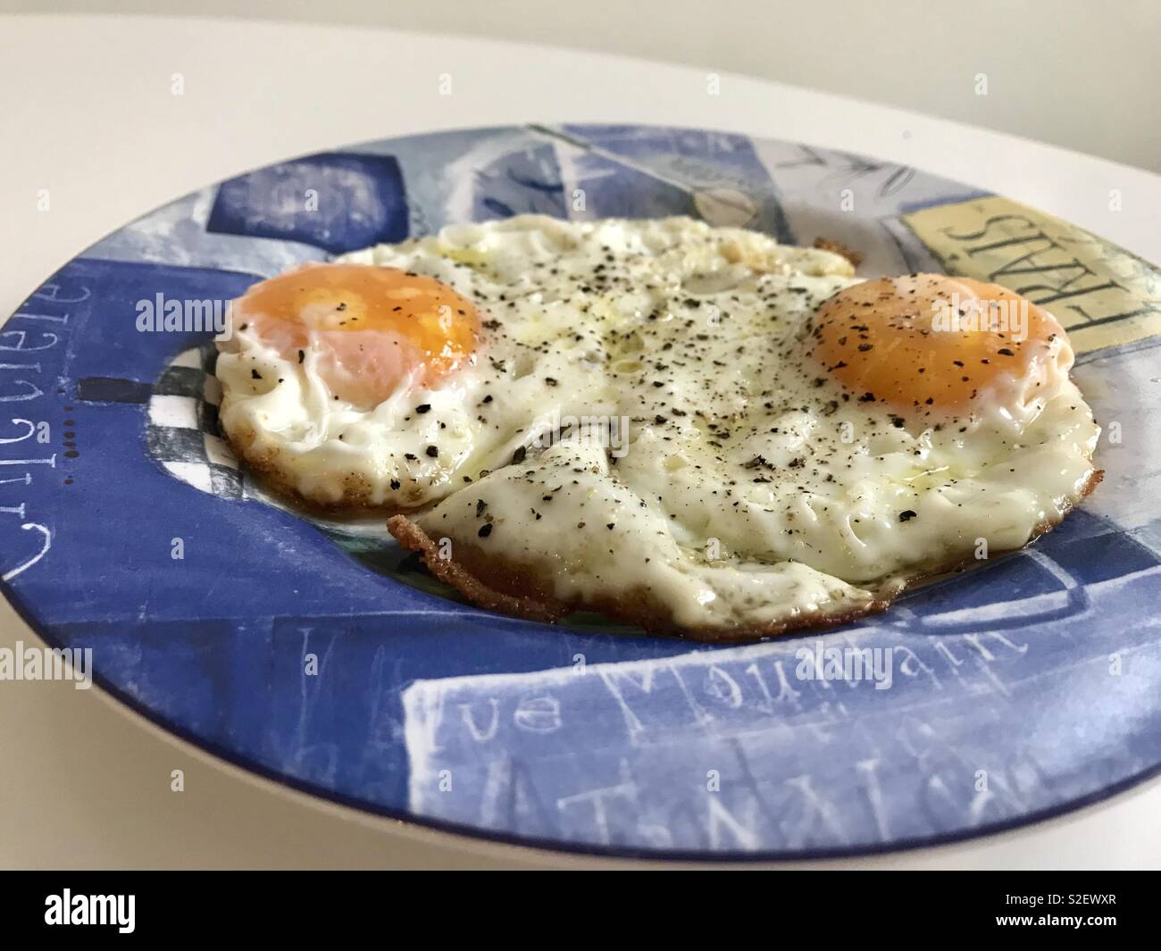 Two eggs sunny side up Stock Photo Alamy
