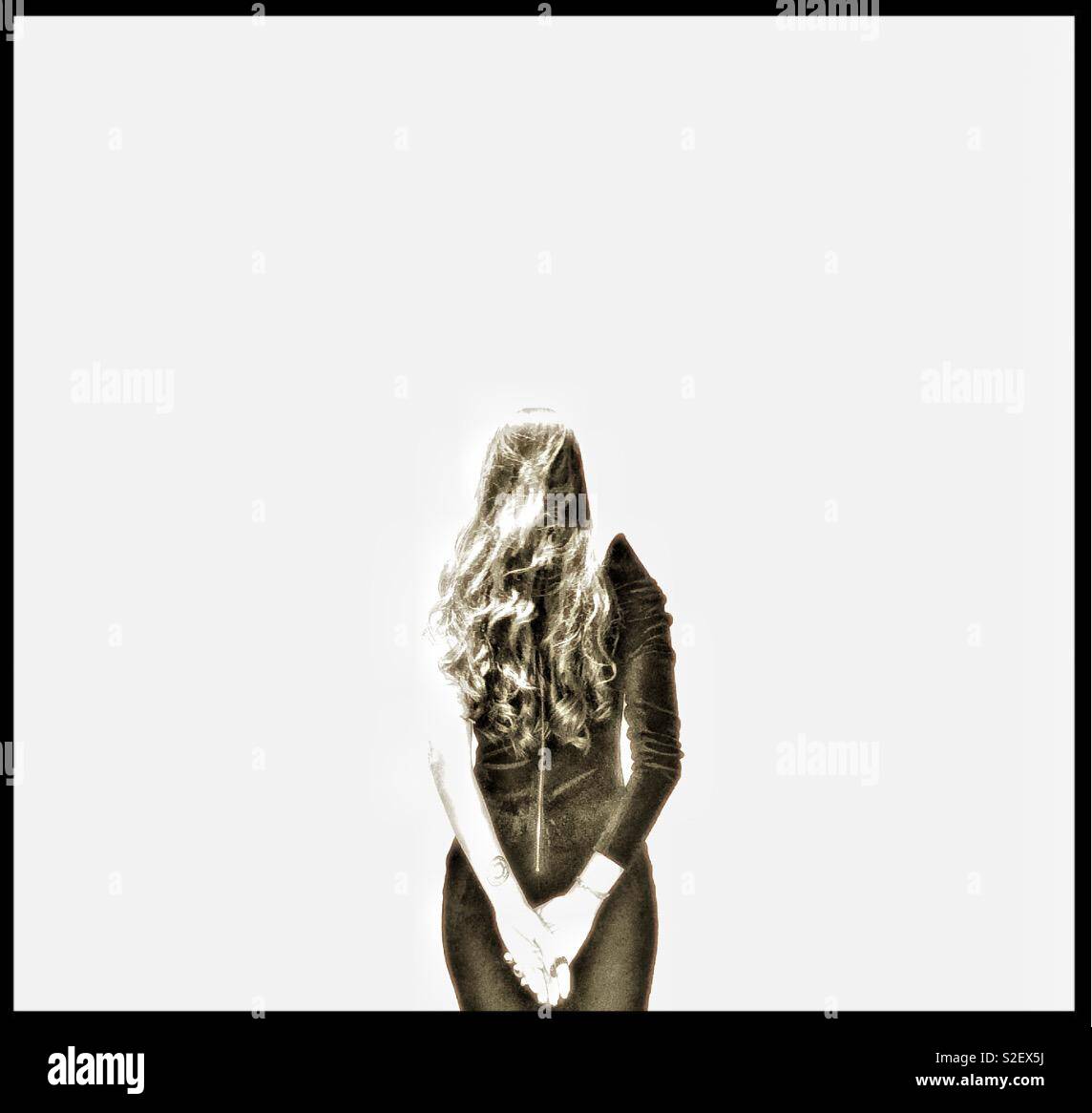 Rear view of a young woman - Smartphone Captured Stock Image