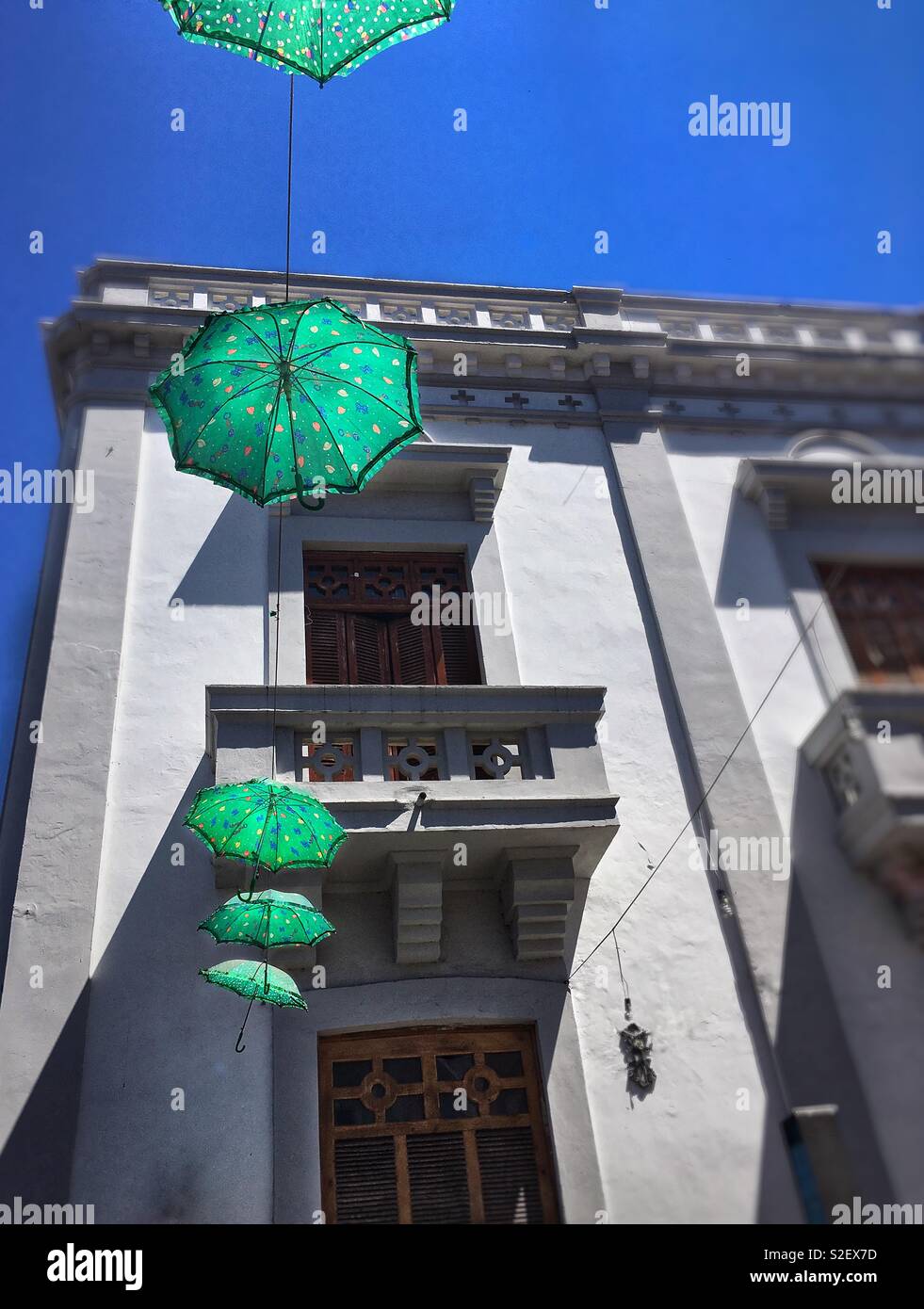 Vibrant hanging umbrellas overhead in Puerto Vallarta, MX Stock Photo