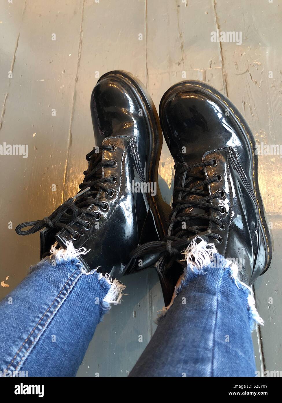 Black patent boots hi-res stock photography and images - Alamy