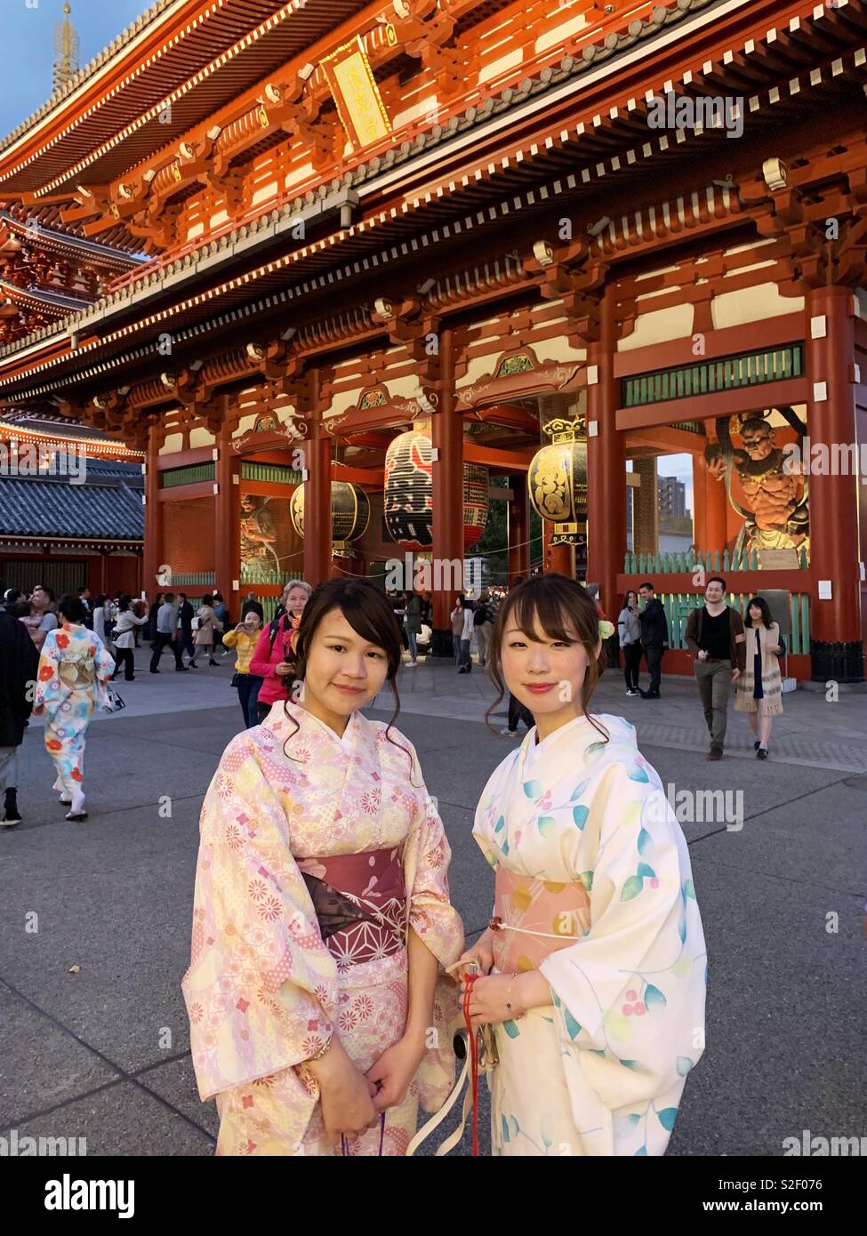 Japanese women in kimonos outside temple, Asakusa, Tokyo,Japan - Smartphone Captured Stock Image
