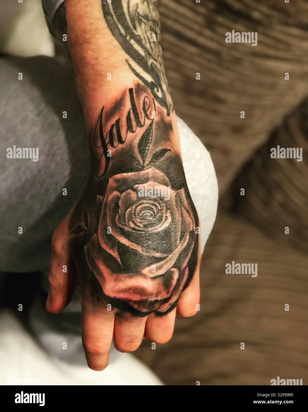 Boyfriend new tattoo Stock Photo - Alamy
