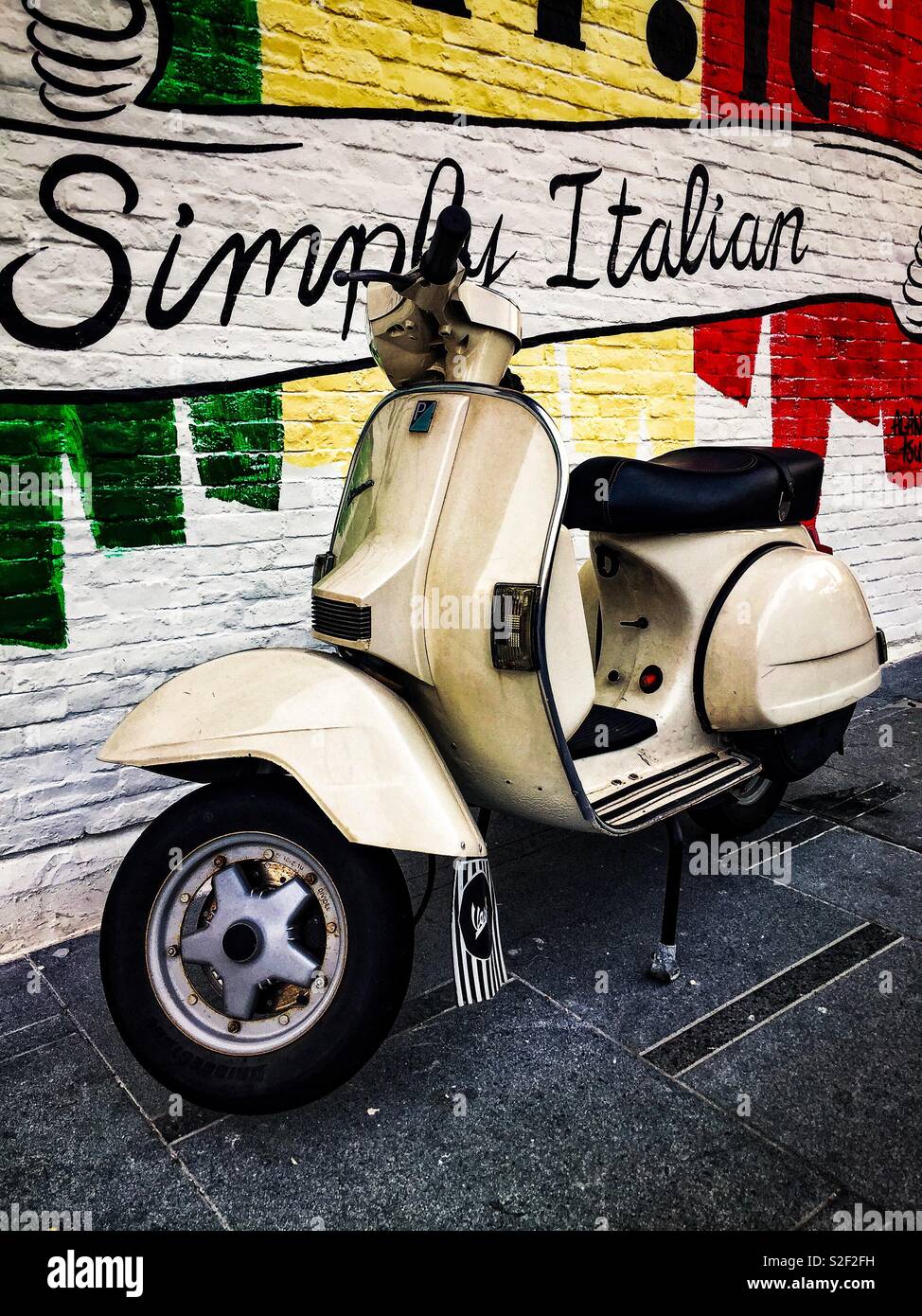 Vespa PX motor scooter with a mural celebrating its Italian heritage Stock  Photo - Alamy