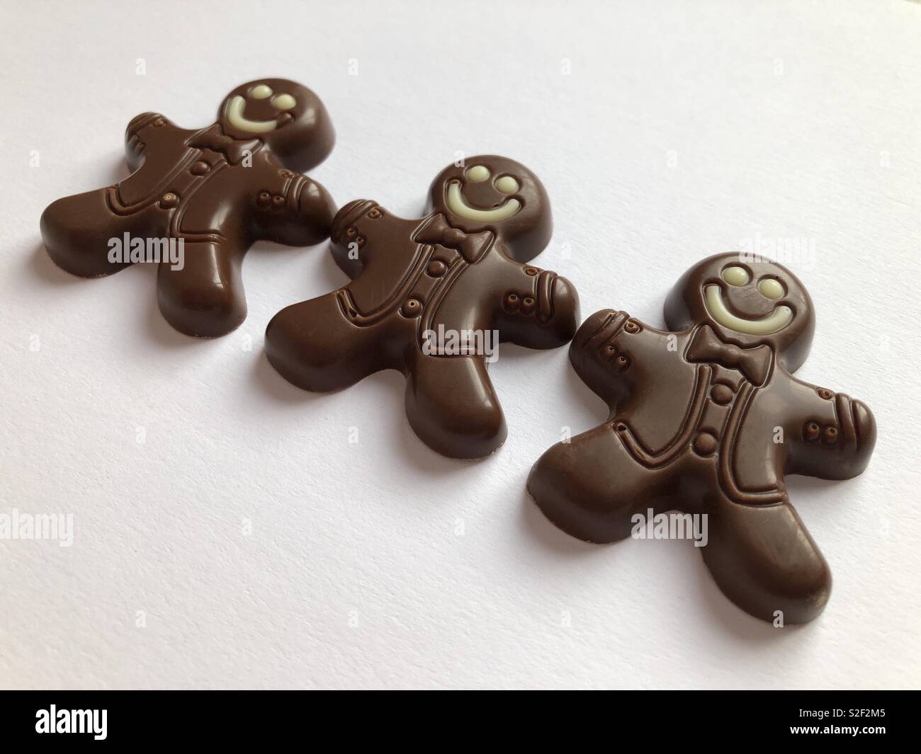 Creative food concept. Chocolate gingerbread men, a Christmas treat - Smartphone Captured Stock Image