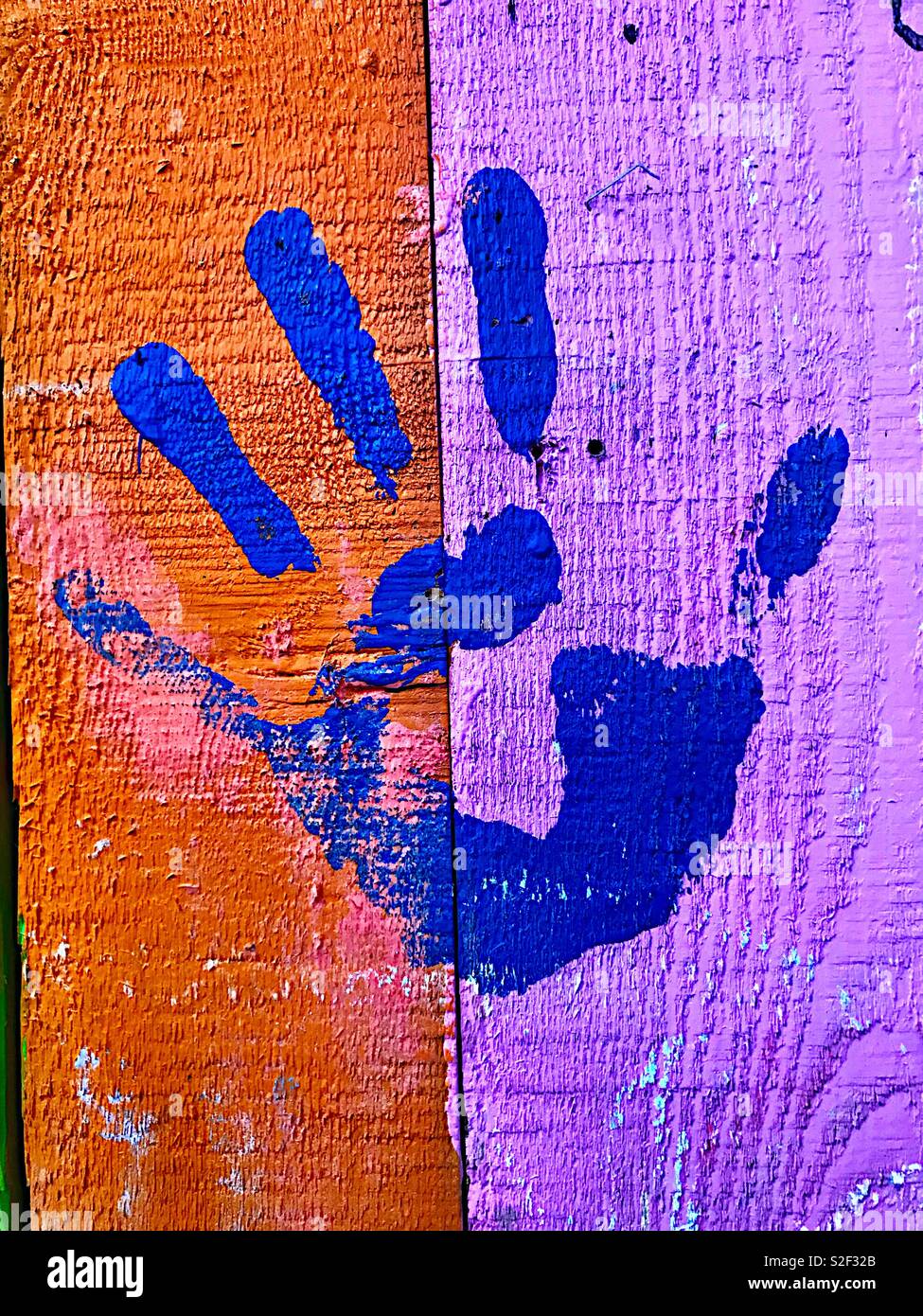 Blue handprint on painted boards - Smartphone Captured Stock Image