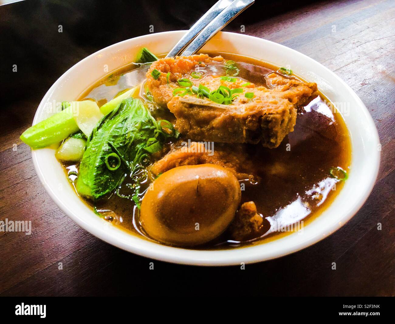 Pork chop with egg in noodle soup. Korean cuisine Stock Photo Alamy