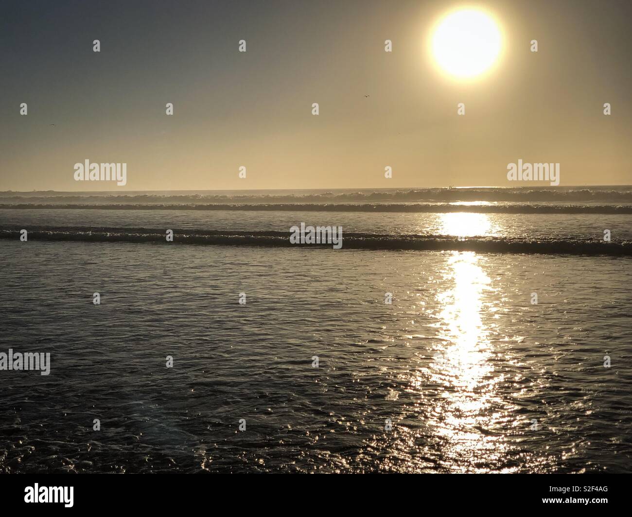 December sunset over the Atlantic Ocean from Agadir Beach, Morocco Stock Photo