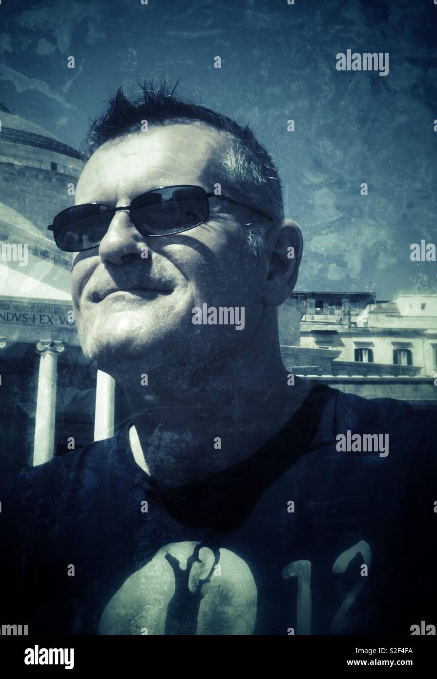 Monochrome Man On Holiday - Smartphone Captured Stock Image