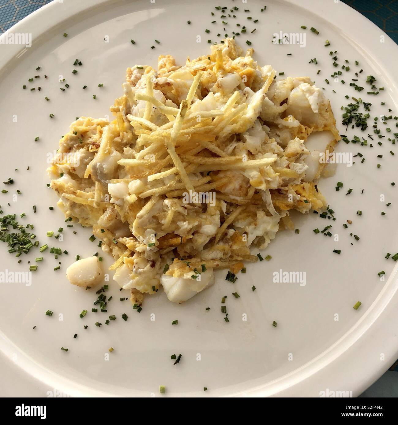 Scrambled eggs with cod fish - Smartphone Captured Stock Image