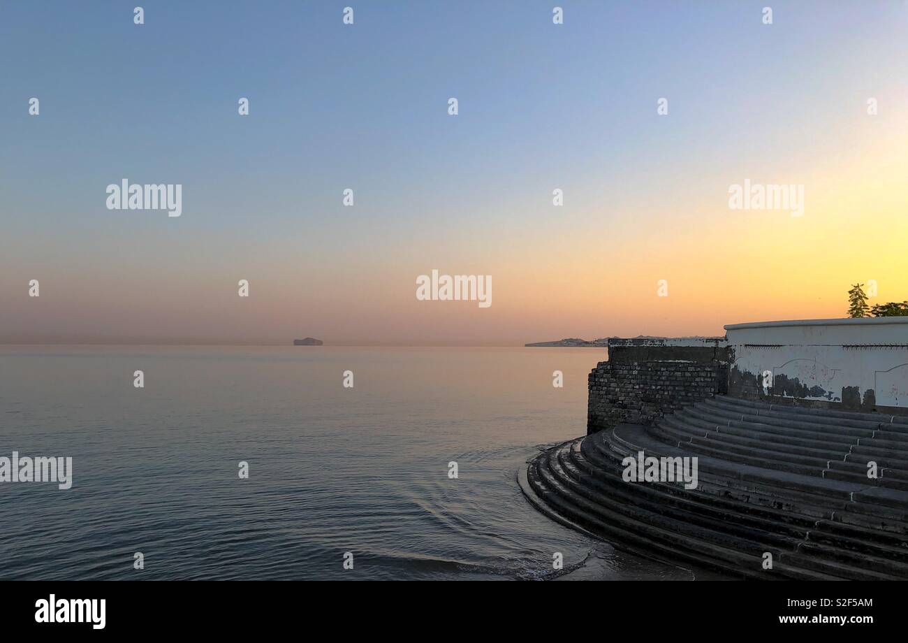 Sunrise over the beach at Shatti Al Qurum, Muscat, Oman Stock Photo Alamy