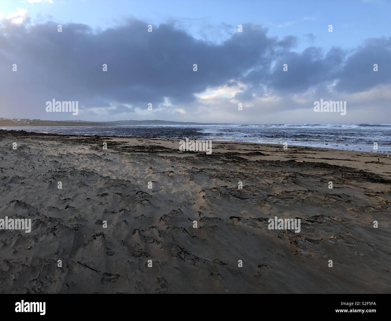 Wintry Skies and a Wind Blown Beach, Ireland - Smartphone Captured Stock Image
