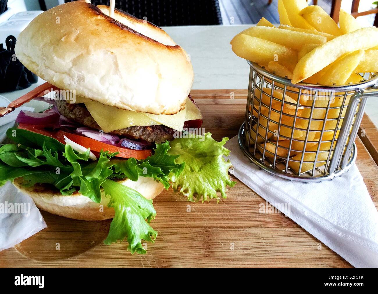 Cheeseburger and fries - Smartphone Captured Stock Image