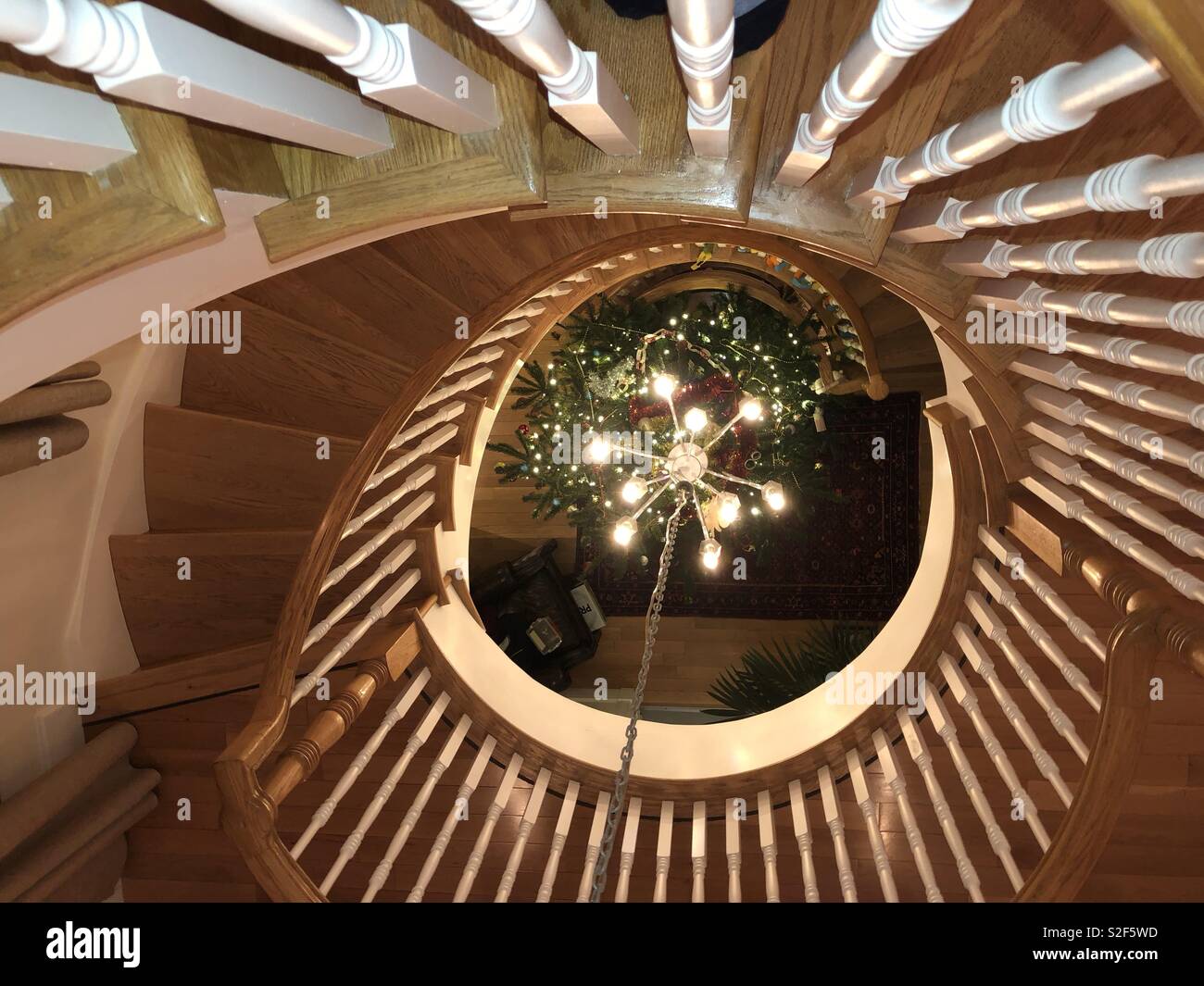 Spiral staircase with central lights Stock Photo