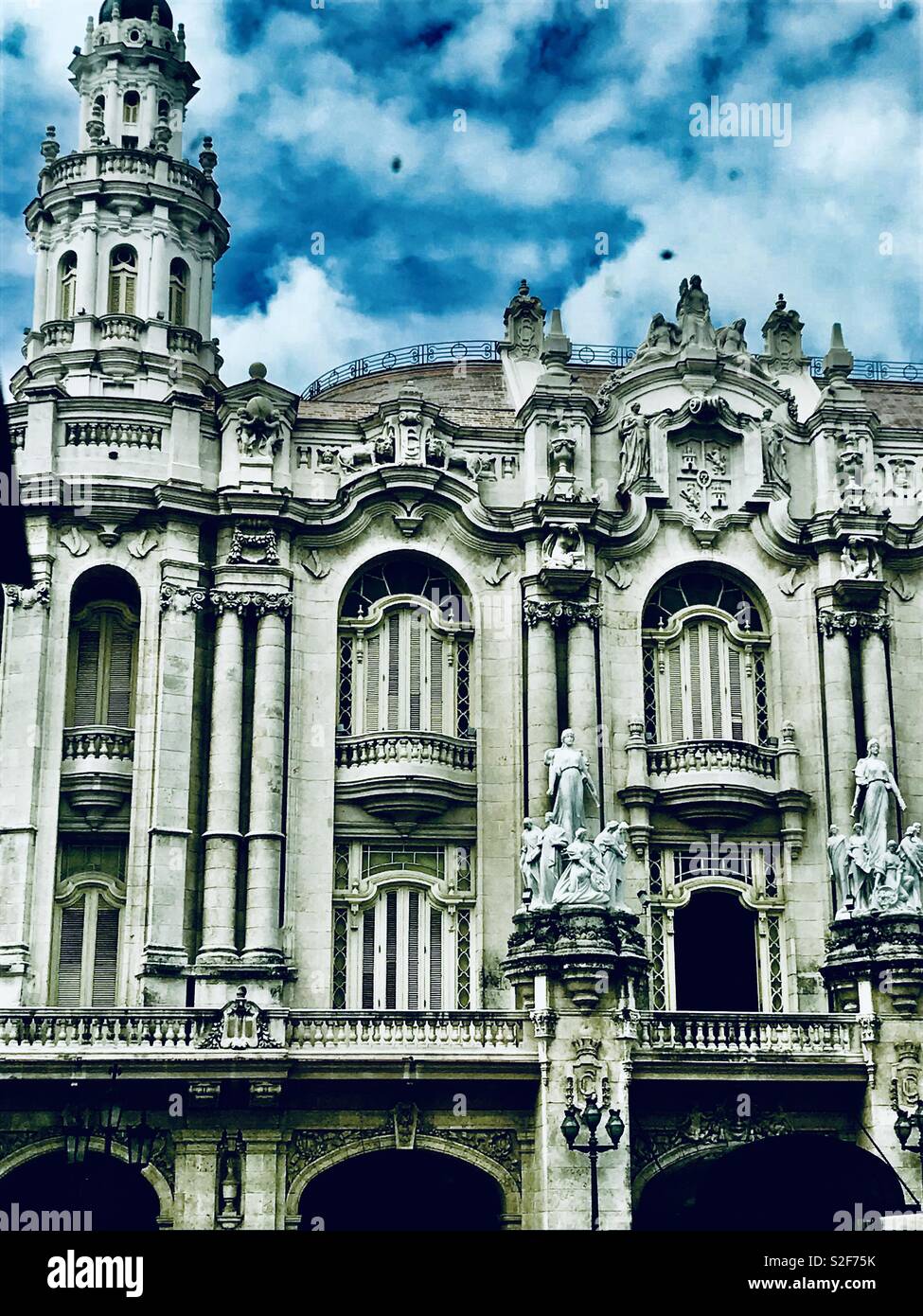 Gran Teatro de La Habana, one of the largest Opera Houses in the world. Designed by Belgian architect, Paul Belau, the theater faces Parque Central and is host to Cuba’s national ballet and opera. Stock Photo